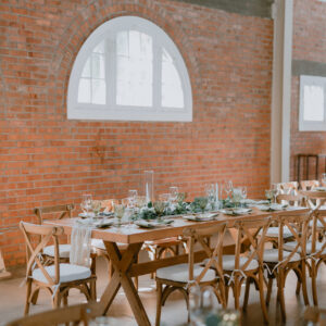 Rustic Wedding Rental Package San Diego farm tables and crossback chairs reception setup