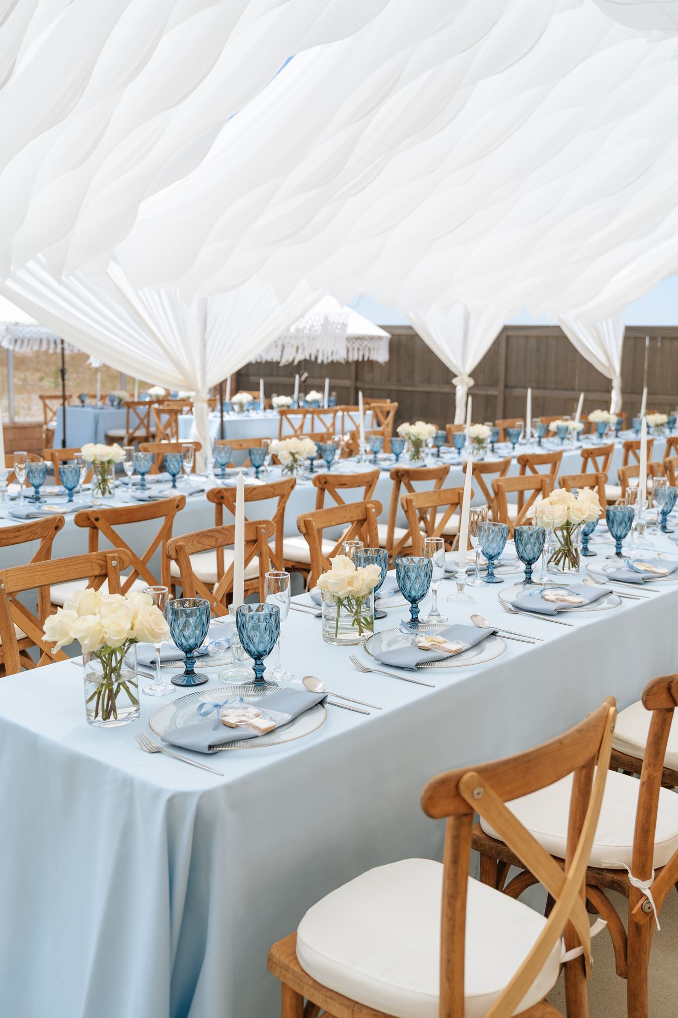Luxury draped tent with styled event tables by Fiesta Events in San Diego