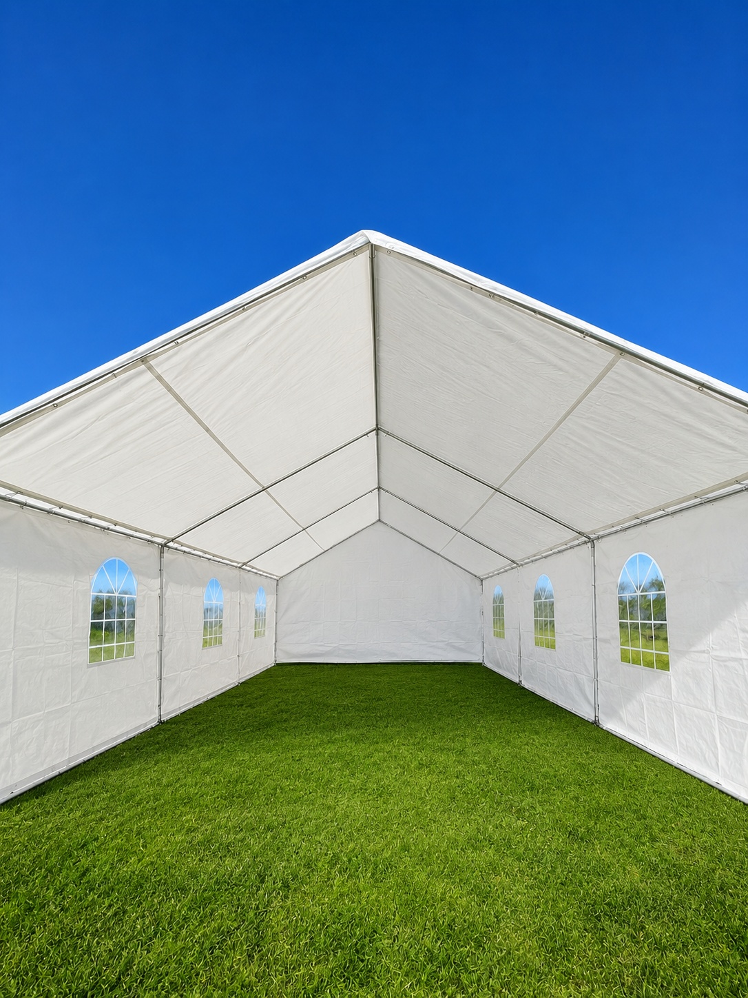 White standard event tent installed on grass in San Diego
